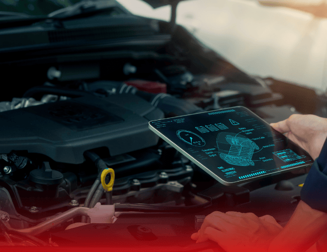 mécanicien en train de faire le contrôle technique d'une voiture à Serres-castet